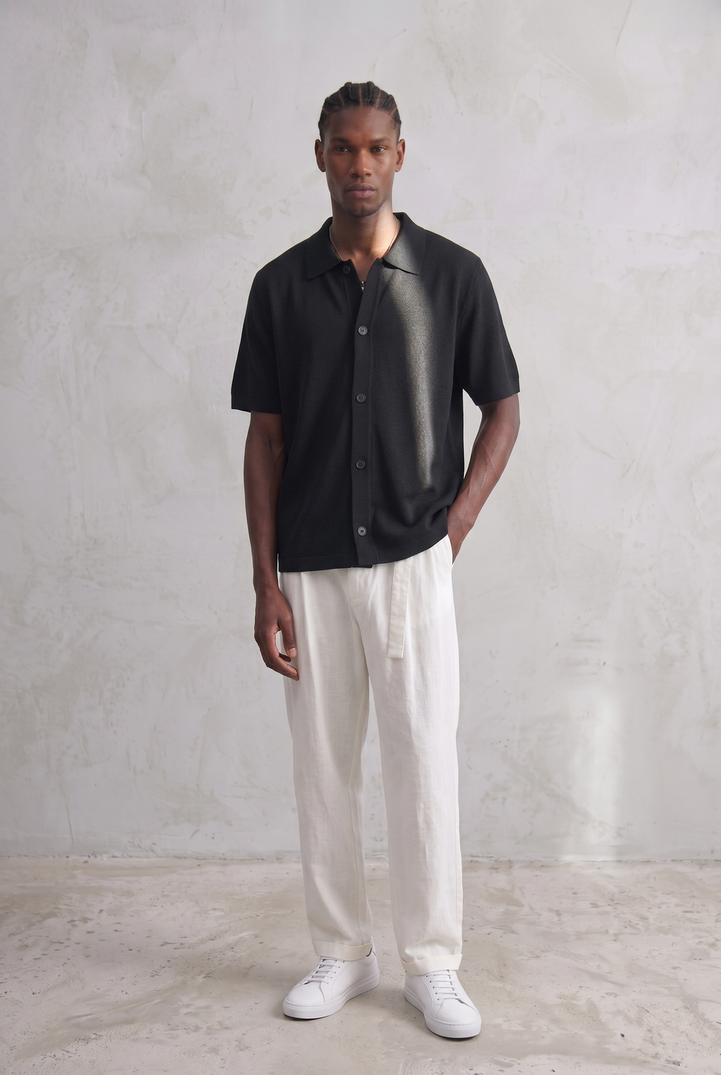 Polo boutonné en maille légère – Noir